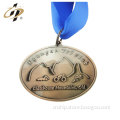 Cheap factory wholesale custom zinc alloy embossed triathlon sports medal medallion with ribbon